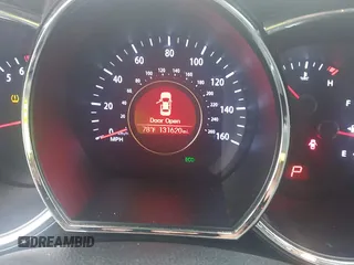 2013 Kia Optima LX z VIN 5XXGM4A70DG098022, wystawiony jako IAAI lot #42367410 z przebiegiem 131 620 mil mil oraz . Historia ofert i sprzedaży dostępna na DreamBid. Obrazek 7.