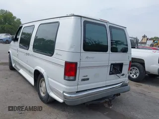 1999 Ford Econoline Cargo with VIN 1FDRE14WXXHB72976, listed as a IAAI auction lot 37688871 with 135,319 mi miles. Bid and sale history available at carsss.com. Image 3.