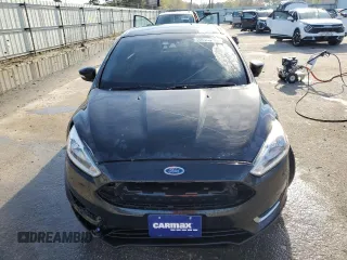 2016 Ford Focus Titanium with VIN 1FADP3J22GL201721, listed as a Copart auction lot 50633795 with 29,801 mi miles and Salvage title. Bid and sale history available at DreamBid. Image 5.