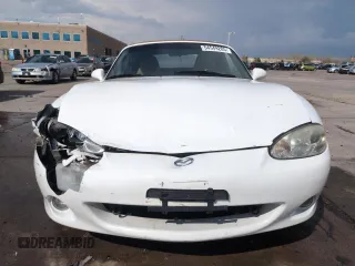 2002 Mazda MX-5 Miata Cloth z VIN JM1NB353X20229549, wystawiony jako Copart lot #54549205 z przebiegiem 79 871 mil mil oraz Szkoda całkowita • Salvage title. Historia ofert i sprzedaży dostępna na DreamBid. Obrazek 5.