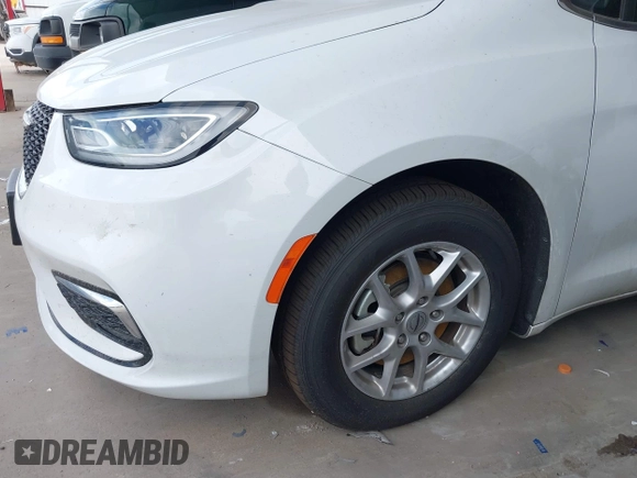 2023 Chrysler Pacifica Touring L with VIN 2C4RC1BG6PR550575, listed as a IAAI auction lot 42576498 with 54,373 mi miles and . Bid and sale history available at DreamBid. Image 21.