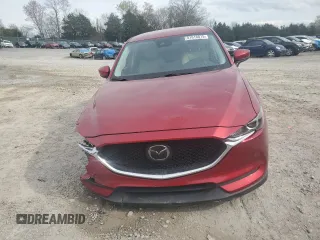 2021 Mazda CX-5 Touring with VIN JM3KFACM7M0334633, listed as a Copart auction lot 51618875 with 70,558 mi miles and Salvage Title. Bid and sale history available at DreamBid. Image 5.