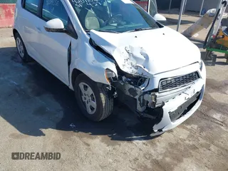 2014 Chevrolet Sonic LS with VIN 1G1JA6SH3E4196824, listed as a IAAI auction lot 42099058 with 66,584 mi miles and . Bid and sale history available at DreamBid. Image 6.