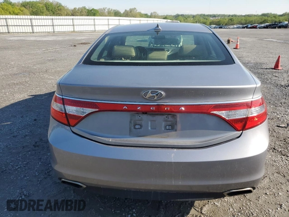 2015 Hyundai Azera z VIN KMHFG4JGXFA483472, wystawiony jako Copart lot #52216745 z przebiegiem 130 758 mil mil oraz Szkoda całkowita • Salvage title. Historia ofert i sprzedaży dostępna na DreamBid. Obrazek 6.