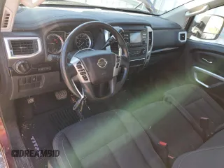 2017 Nissan Titan with VIN 1N6BA1R97HN520169, listed as a Copart auction lot 82783774 with 203,684 mi miles and Salvage title. Bid and sale history available at DreamBid. Image 8.