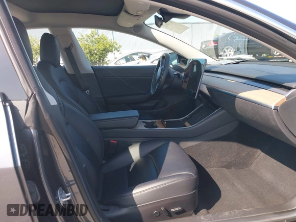2018 Tesla Model 3 Long Range Battery with VIN 5YJ3E1EA4JF024102, listed as a IAAI auction lot 42100621 with 86,298 mi miles and . Bid and sale history available at DreamBid. Image 5.