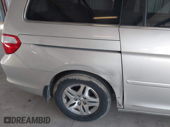 2005 Honda Odyssey EX-L with VIN 5FNRL38705B106488, listed as a IAAI auction lot 42545141 with 199,619 mi miles and . Bid and sale history available at DreamBid. Image 6.