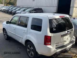 2015 Honda Pilot SE with VIN 5FNYF4H39FB028011, listed as a IAAI auction lot 42160830 with 202,846 mi miles and . Bid and sale history available at DreamBid. Image 3.
