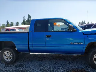 2001 Dodge 1500 z VIN 3B7HF13Z31M533735, wystawiony jako IAAI lot #42417352 z przebiegiem 184 487 mil mil oraz . Historia ofert i sprzedaży dostępna na DreamBid. Obrazek 14.