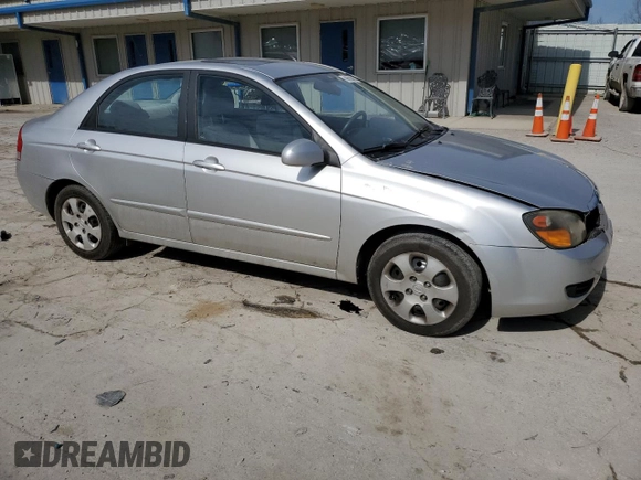 2009 Kia Spectra EX with VIN KNAFE221195655309, listed as a Copart auction lot 46620985 with 105,607 mi miles and Salvage Title. Bid and sale history available at DreamBid. Image 4.