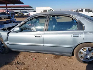 1995 Honda Accord EX w/Leather with VIN 1HGCD5666SA075326, listed as a IAAI auction lot 41266376 with 139,204 mi miles. Bid and sale history available at carsss.com. Image 14.