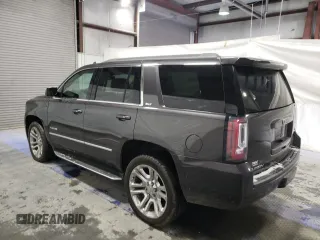 2018 GMC Yukon SLT with VIN 1GKS1BKCXJR293982, listed as a Copart auction lot 41860985 with 106,966 mi miles and Clean Title. Bid and sale history available at carsss.com. Image 2.