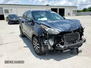 2017 Kia Sportage EX z VIN KNDPN3ACXH7269653, wystawiony jako Copart lot #61232405 z przebiegiem 162 869 mil mil oraz Szkoda całkowita • Salvage title. Historia ofert i sprzedaży dostępna na DreamBid. Obrazek 13.