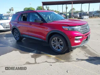 2022 Ford Explorer XLT with VIN 1FMSK7DH0NGB40877, listed as a IAAI auction lot 41947002 with 14,727 mi miles and . Bid and sale history available at DreamBid. Image 1.