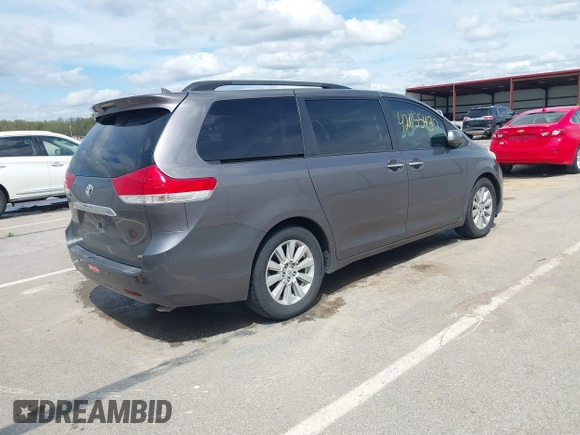2011 Toyota Sienna XLE AAS with VIN 5TDYK3DC1BS069668, listed as a IAAI auction lot 42055430 with 212,167 mi miles and . Bid and sale history available at DreamBid. Image 4.