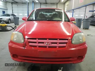 2005 Hyundai Accent GLS with VIN KMHCG45C05U661607, listed as a Copart auction lot 71812814 with 238,630 mi miles and Salvage Title. Bid and sale history available at carsss.com. Image 5.