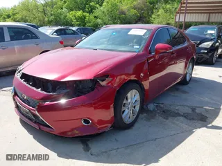 2014 Lexus ES 300h Hybrid with VIN JTHBW1GG0E2048706, listed as a IAAI auction lot 42019842 with 196,674 mi miles. Bid and sale history available at carsss.com. Image 21.