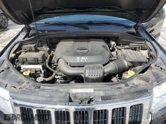 2012 Jeep Grand Cherokee Laredo with VIN 1C4RJFAG7CC347038, listed as a Copart auction lot 51181285 with 159,291 mi miles and Salvage Title. Bid and sale history available at carsss.com. Image 12.