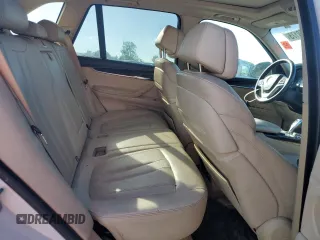 2014 BMW X5 xDrive50i z VIN 5UXKR6C57E0C03114, wystawiony jako Copart lot #57940175 z przebiegiem 165 249 mil mil oraz Czysty tytuł • Clean title. Historia ofert i sprzedaży dostępna na DreamBid. Obrazek 11.