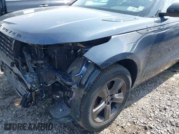 2025 Land Rover Range Rover Velar Dynamic SE with VIN SALYL2EX9SA809479, listed as a IAAI auction lot 42150495 with 7,038 mi miles and . Bid and sale history available at DreamBid. Image 2.