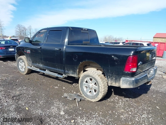 2014 Ram 2500 SLT with VIN 3C6UR5DLXEG280609, listed as a IAAI auction lot 41753347 with 167,000 mi miles. Bid and sale history available at carsss.com. Image 3.