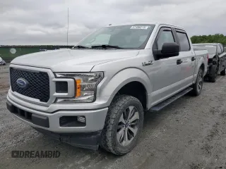 2019 Ford F-150 XL with VIN 1FTEW1CP8KFC40609, listed as a Copart auction lot 57498215 with 161,131 mi miles and Salvage title. Bid and sale history available at DreamBid. Image 1.