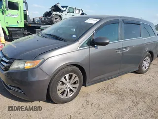 2015 Honda Odyssey EX-L with VIN 5FNRL5H67FB130663, listed as a IAAI auction lot 41988034 with 180,254 mi miles and . Bid and sale history available at carsss.com. Image 2.