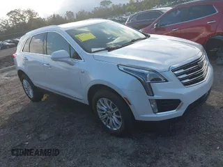 2019 Cadillac XT5 FWD with VIN 1GYKNARS7KZ164780, listed as a IAAI auction lot 41210900 with 84,609 mi miles and . Bid and sale history available at carsss.com. Image 1.