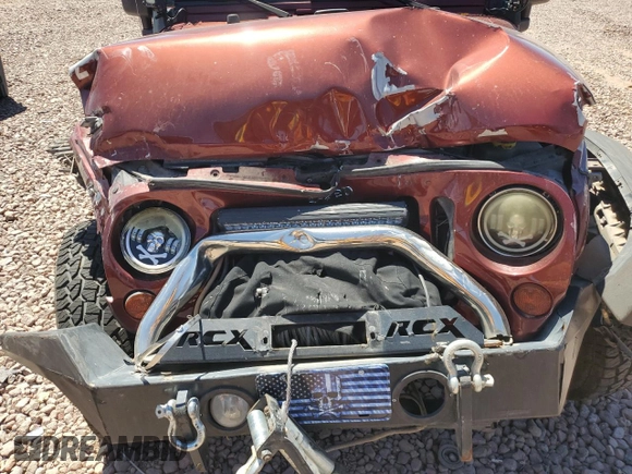 2010 Jeep Wrangler Rubicon with VIN 1J4BA6D14AL167077, listed as a Copart auction lot 54233795 with 148,638 mi miles and Salvage title. Bid and sale history available at DreamBid. Image 11.