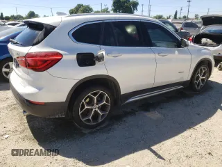 2018 BMW X1 sDrive28i with VIN WBXHU7C31J5H44190, listed as a Copart auction lot 67802544 with 96,973 mi miles and Clean Title. Bid and sale history available at carsss.com. Image 3.