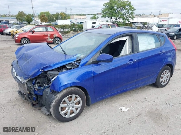 2012 Hyundai Accent GS with VIN KMHCT5AE9CU036421, listed as a IAAI auction lot 40410679 with 99,288 mi miles. Bid and sale history available at carsss.com. Image 2.