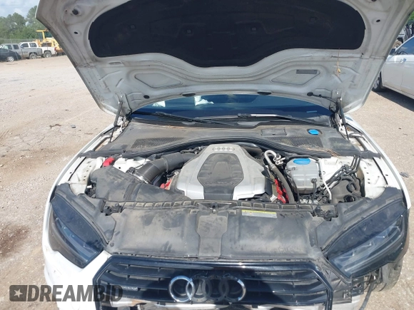 2016 Audi A7 Premium Plus with VIN WAUWGAFC2GN021696, listed as a IAAI auction lot 42595234 with 112,464 mi miles and . Bid and sale history available at DreamBid. Image 10.