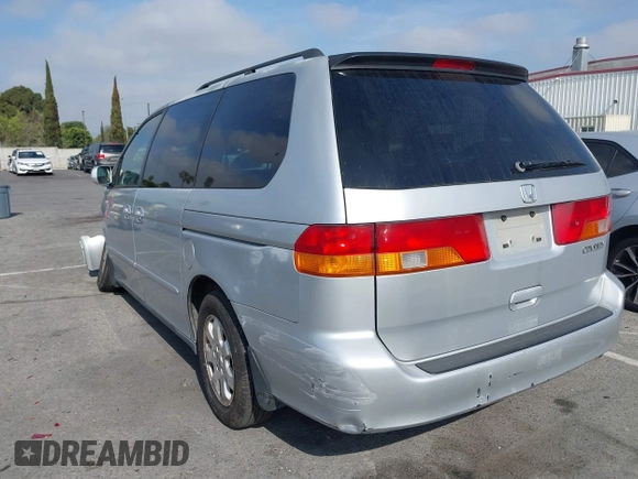 2004 Honda Odyssey EX with VIN 5FNRL18684B143038, listed as a IAAI auction lot 42083469 with 160,317 mi miles and . Bid and sale history available at DreamBid. Image 3.