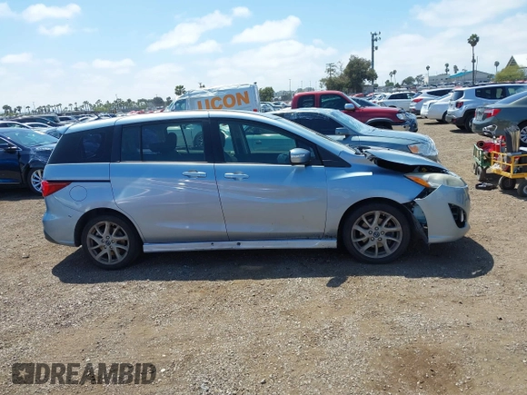 2013 Mazda 5 Touring with VIN JM1CW2CL8D0145628, listed as a IAAI auction lot 42148184 with 137,150 mi miles and . Bid and sale history available at DreamBid. Image 13.