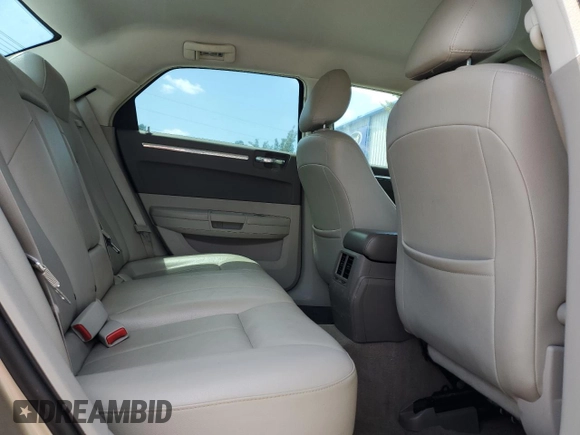 2009 Chrysler 300 Touring with VIN 2C3KA53V69H592639, listed as a Copart auction lot 55209775 with 107,751 mi miles and Salvage Title. Bid and sale history available at DreamBid. Image 10.