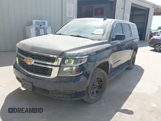 2017 Chevrolet Tahoe Commercial with VIN 1GNLCDEC4HR310570, listed as a IAAI auction lot 42416737 with 92,000 mi miles and . Bid and sale history available at DreamBid. Image 2.