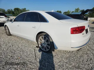2014 Audi A8 3.0T with VIN WAURGAFD1EN002429, listed as a Copart auction lot 63762475 with 140,884 mi miles and Clean title. Bid and sale history available at DreamBid. Image 2.