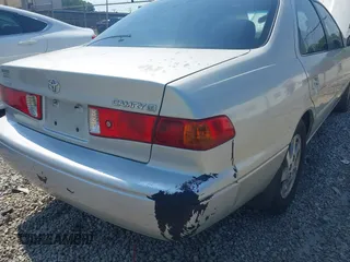 2001 Toyota Camry CE with VIN 4T1BG22K11U805882, listed as a IAAI auction lot 42576999 with 300,777 mi miles and . Bid and sale history available at DreamBid. Image 12.