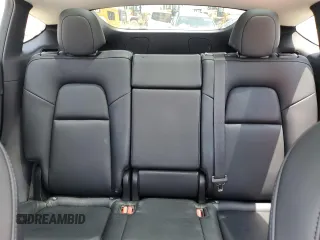 2022 Tesla Model Y Long Range z VIN 7SAYGDEE7NF313228, wystawiony jako Copart lot #55060705 z przebiegiem 32 238 mil mil oraz Szkoda całkowita • Salvage title. Historia ofert i sprzedaży dostępna na DreamBid. Obrazek 10.