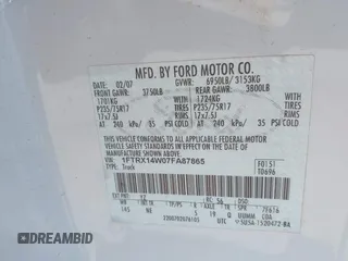 2007 Ford F-150 STX with VIN 1FTRX14W07FA87865, listed as a IAAI auction lot 42333510 with 173,973 mi miles and . Bid and sale history available at DreamBid. Image 9.