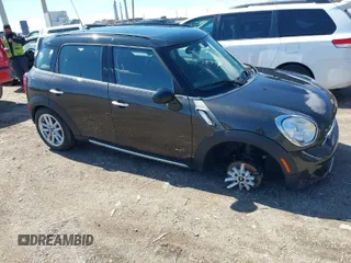 2016 MINI Countryman S with VIN WMWZC5C51GWU02486, listed as a IAAI auction lot 41858950 with 112,307 mi miles and . Bid and sale history available at DreamBid. Image 1.
