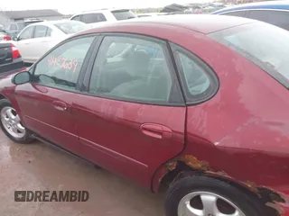 2006 Ford Taurus SE with VIN 1FAFP53U96A105453, listed as a IAAI auction lot 41927639 with 132,670 mi miles. Bid and sale history available at carsss.com. Image 14.