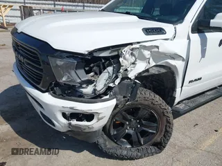2020 Ram 1500 Big Horn with VIN 1C6SRFFT1LN103090, listed as a IAAI auction lot 41919577 with 70,429 mi miles and . Bid and sale history available at DreamBid. Image 6.