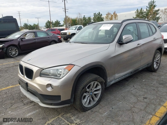2015 BMW X1 xDrive28i with VIN WBAVL1C55FVY41749, listed as a IAAI auction lot 40977221 with 120,924 mi miles. Bid and sale history available at carsss.com. Image 2.