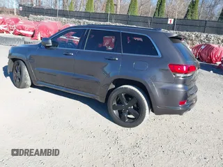 2015 Jeep Grand Cherokee Overland with VIN 1C4RJFCGXFC215750, listed as a IAAI auction lot 40795135 with 89,110 mi miles and . Bid and sale history available at DreamBid. Image 3.