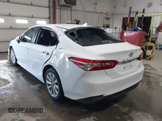 2019 Toyota Camry LE with VIN 4T1B11HK4KU853137, listed as a IAAI auction lot 41633785 with 67,629 mi miles and . Bid and sale history available at DreamBid. Image 3.