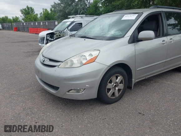 2008 Toyota Sienna XLE with VIN 5TDZK22C28S100727, listed as a IAAI auction lot 42570297 with 184,422 mi miles and . Bid and sale history available at DreamBid. Image 6.