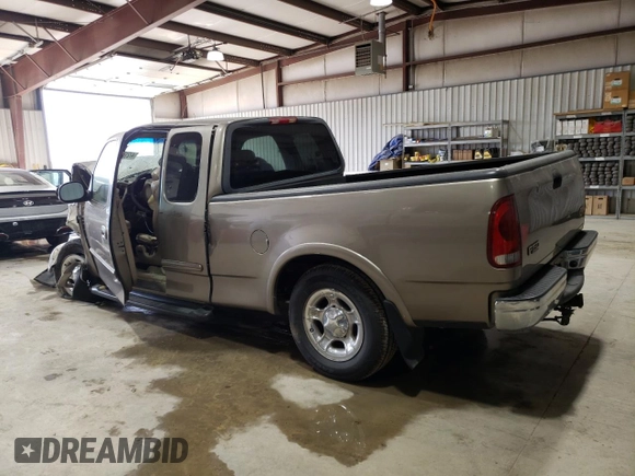 2003 Ford F-150 XL with VIN 1FTRX17W63NB22887, listed as a Copart auction lot 47218115 with 0 mi miles and Salvage Title. Bid and sale history available at carsss.com. Image 2.