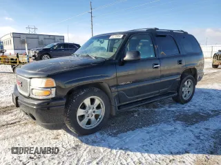2001 GMC Yukon Denali z VIN 1GKEK63U01J253479, wystawiony jako Copart lot #83272054 z przebiegiem 217 364 mil mil oraz Czysty tytuł • Clean title. Historia ofert i sprzedaży dostępna na DreamBid. Obrazek 1.