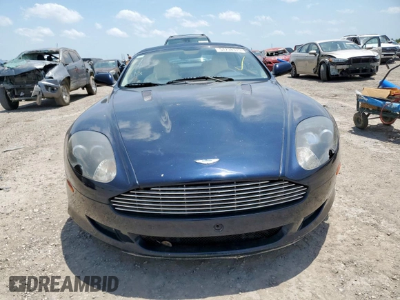 2007 Aston Martin DB9 z VIN SCFAD02A57GB08568, wystawiony jako Copart lot #57238375 z przebiegiem 41 255 mil mil oraz Tytuł czysty. Historia ofert i sprzedaży dostępna na DreamBid. Obrazek 5.